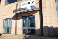 Twinfix head office front door with Twinfix logo above the door